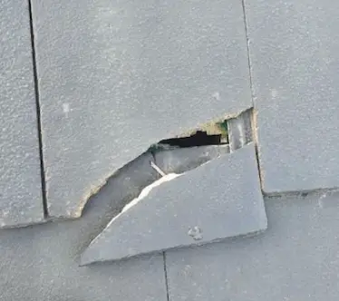Corner chip on roof tile