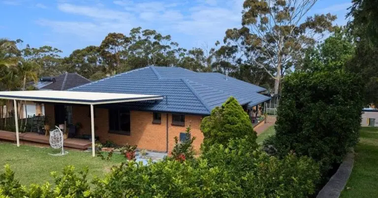 Completed roof restoration with topcoat finish and sealed concrete tiles in Adelaide fully sealed with primer